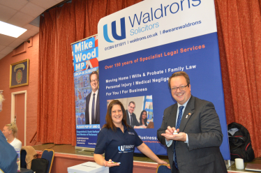 Mike with Lisa Martin-Booth of Waldrons Solicitors at his 2024 Older People's Information Fair